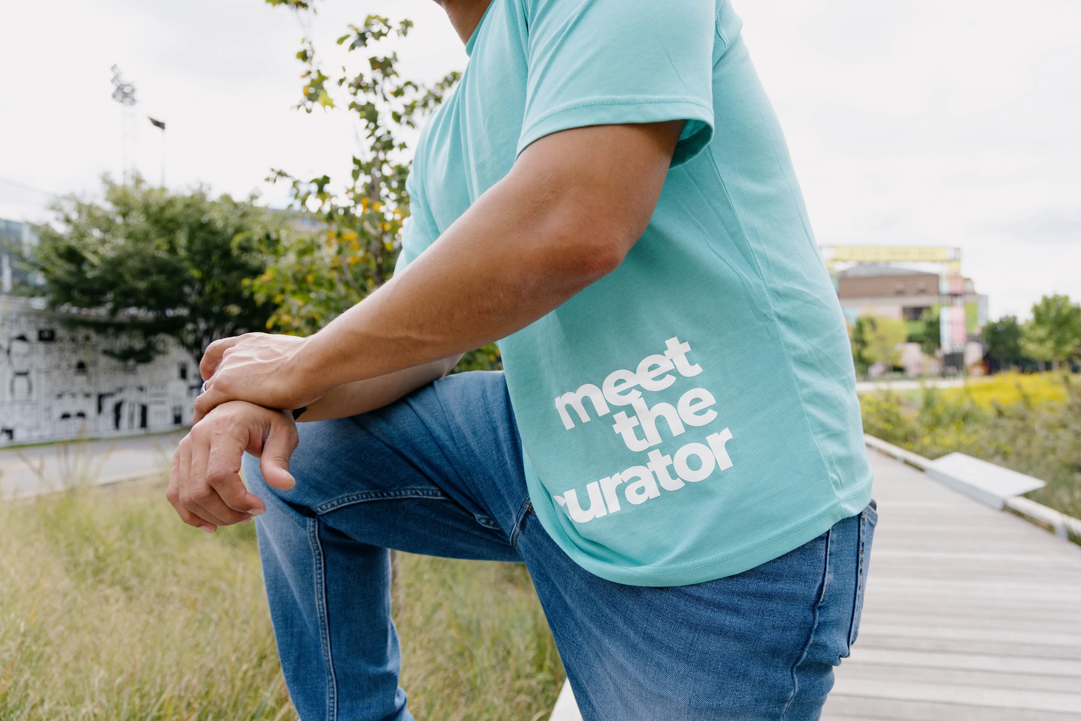 Meet The Curator - Big Face Logo